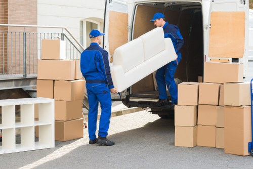 Man with van service loading items in Homerton street