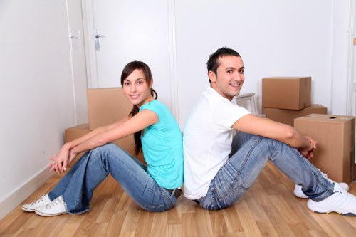 Careful lifting and carrying during a flat removal in Homerton
