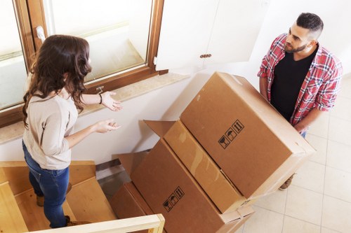 Removal staff handling furniture with public liability insurance cover