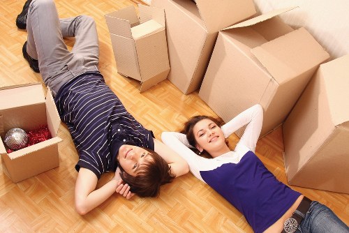 Staff preparing for office removals in Homerton with labeled packing materials