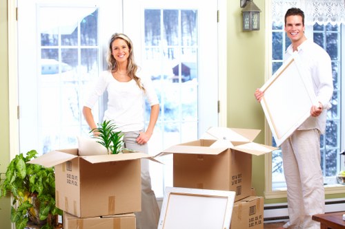 Local moving van loading household items in Homerton
