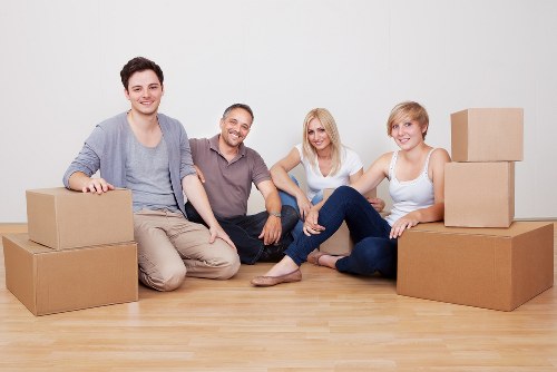 Packed moving boxes and furniture prepared for same day removals in Homerton